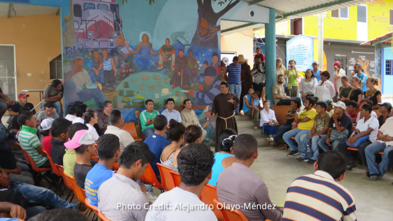 Group of people listening to a speaker in Mexico